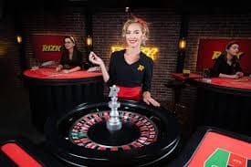wisnu slot live-dealer studio with professional croupiers and HD camera setup